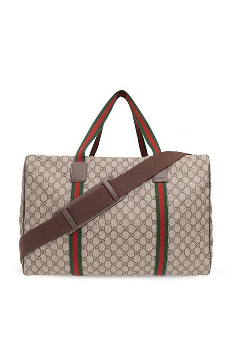 Gucci GG Supreme Canvas Holdalls 